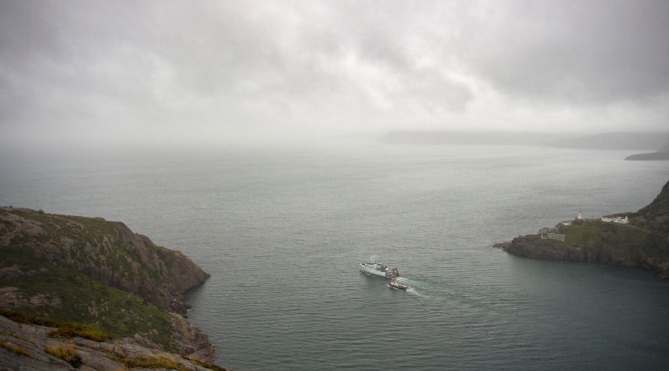 Fog moves in as the research vessel Hugh R. Sharp departs St. John's Harbor in Newfoundland, Canada