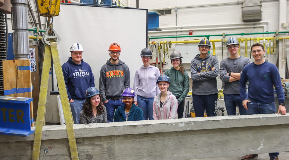 Team 2 Testing in the beam fabrication lab.